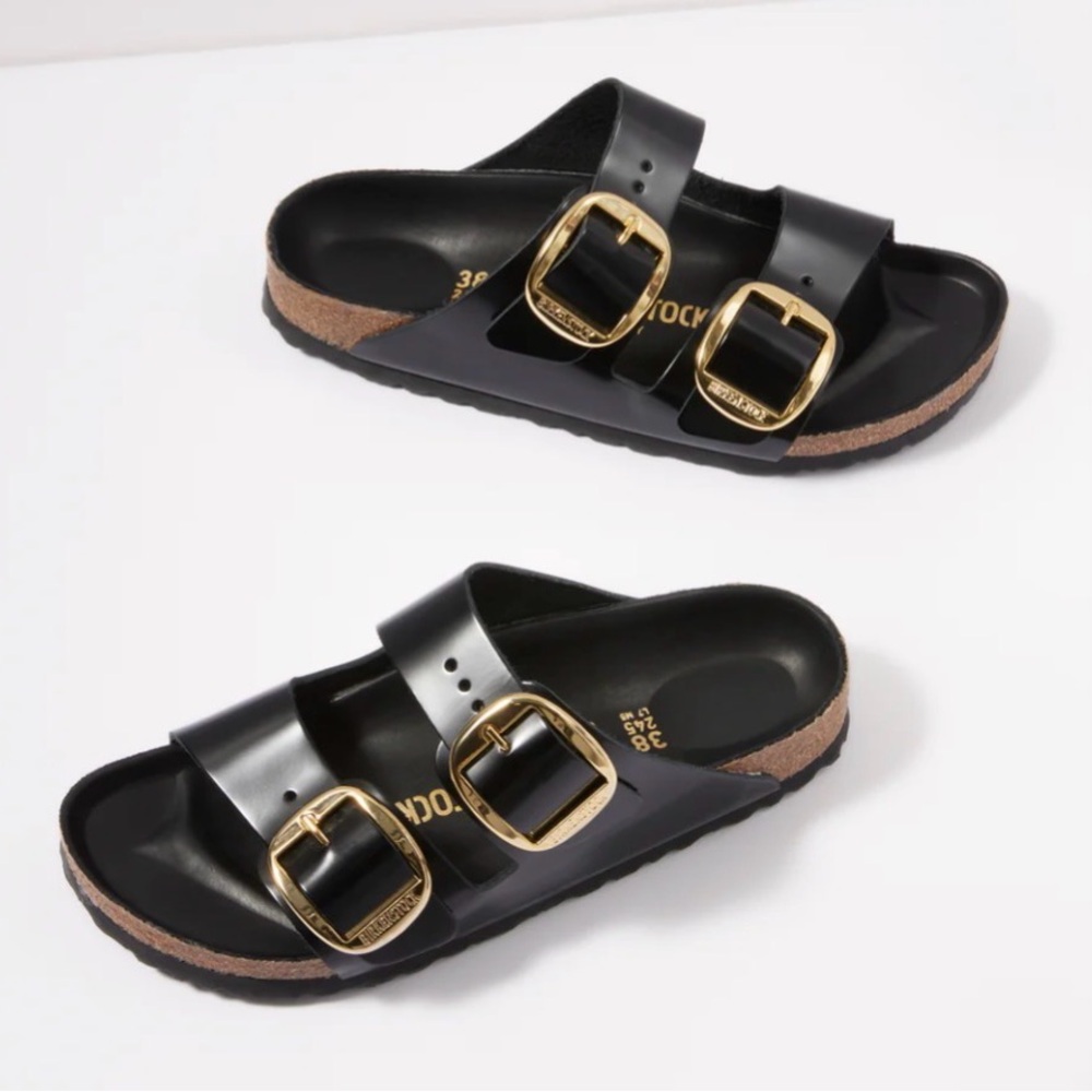 Birkenstock High Shine Black Sandals with Gold Buckles